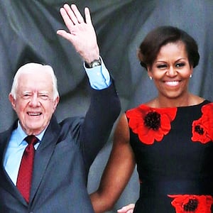 WASHINGTON, DC - AUGUST 28:  President Barack Obama (L) stands with First Lady Michelle Obama (2nd-R) and former presidents Jimmy Carter (2nd-L) and Bill Clinton during the ceremony to commemorate the 50th anniversary of the March on Washington for Jobs and Freedom August 28, 2013 in Washington, DC. It was 50 years ago today that Martin Luther King, Jr. delivered his "I Have A Dream Speech" on the steps of the Lincoln Memorial. (Photo by Mark Wilson/Getty Images)