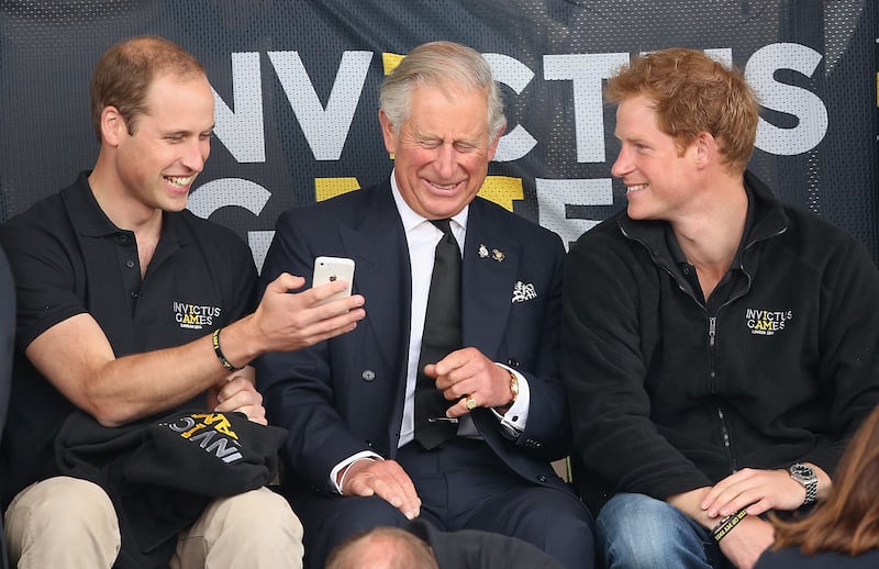 Prince William, Prince Harry and King  Charles enjoy a laugh together, back in 2014