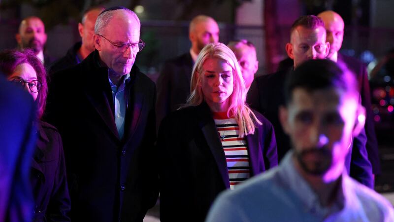 U.S. Attorney General Pam Bondi and the Israeli ambassador to the U.S., Yechiel Leiter, visit the site where two Israeli embassy staff were shot dead.