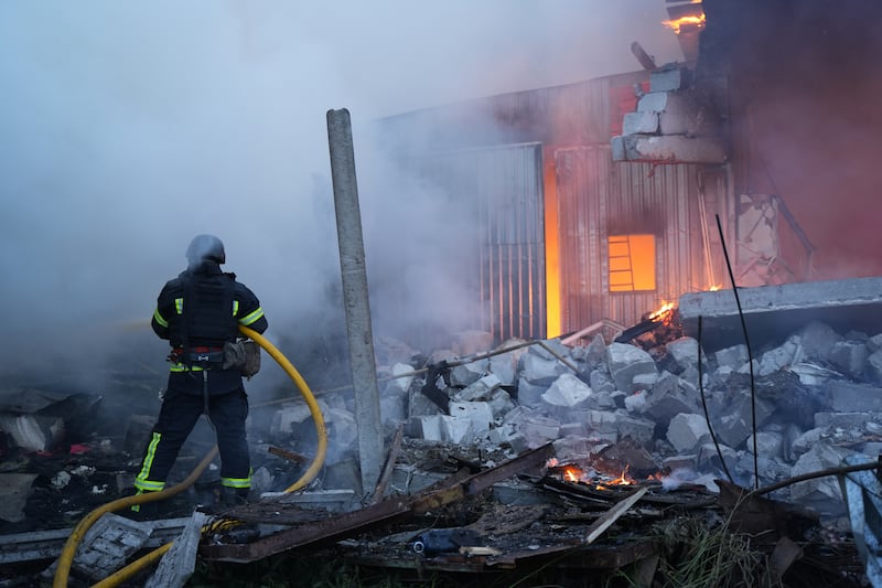 KHARKIV, UKRAINE - JUNE 4: Rescue workers extinguish a fire on a civilian enterprise in the Novobavarskyi district struck by a Russian drone on June 4, 2025 in Kharkiv, Ukraine. At night, the Russian army attacked the Novobavarskyi district of Kharkiv with combat drones and missiles, resulting in destructions and fires in industrial and residential areas. (Photo by Viacheslav Mavrychev/Suspilne Ukraine/JSC "UA:PBC"/Global Images Ukraine via Getty Images)