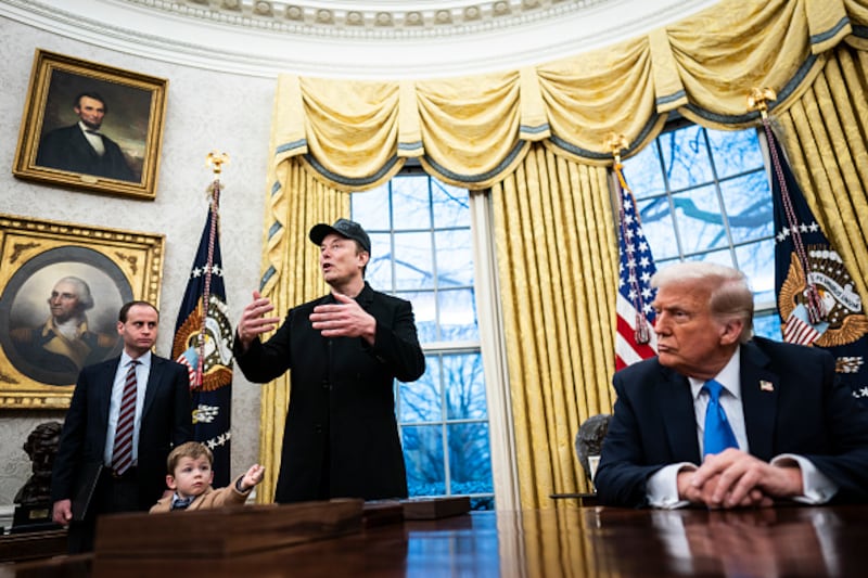 Washington, DC - February 11 : Elon Musk, with his son X Æ A-Xii, speaks with President Donald J Trump and reporters in the Oval Office at the White House on Tuesday, Feb 11, 2025 in Washington, DC. (Photo by Jabin Botsford/The Washington Post via Getty Images)
