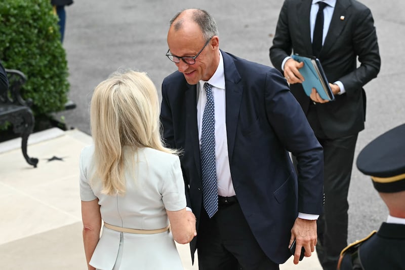 German Chancellor Friedrich Merz was greeted by Chief of Protocol Monica Crowley upon arrival at the White House South Portico in Washington, DC, on August 18, 2025.