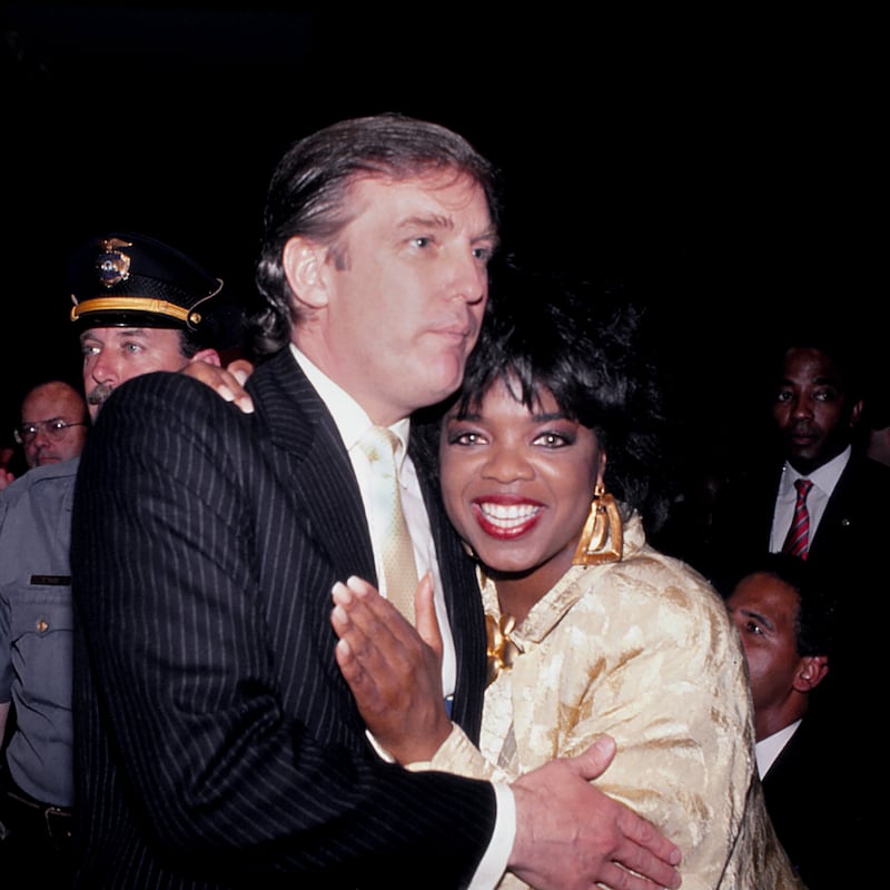 Donald Trump and Oprah Winfrey ringside at Mike Tyson vs. Larry Holmes at Trump Plaza in Atlantic City, New Jersey on January 22 1988.
