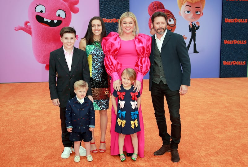 LOS ANGELES, CALIFORNIA - APRIL 27: (L-R) Seth Blackstock, Remington Alexander Blackstock, Savannah Blackstock, Kelly Clarkson, River Rose Blackstock, and Brandon Blackstock attend STX Films World Premiere of "UglyDolls" at Regal Cinemas L.A. Live on April 27, 2019 in Los Angeles, California.
