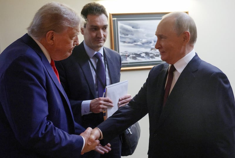 Trump shakes hands with Putin before a joint news conference following their meeting at Joint Base Elmendorf-Richardson in Anchorage, Alaska.