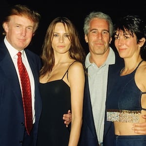 From left, American real estate developer Donald Trump and his girlfriend (and future wife), former model Melania Knauss, financier (and future convicted sex offender) Jeffrey Epstein, and British socialite Ghislaine Maxwell pose together at the Mar-a-Lago club, Palm Beach, Florida, February 12, 2000. (Photo by Davidoff Studios/Getty Images)