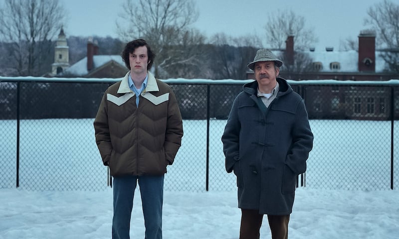 Dominic Sessa and Paul Giamatti in The Holdovers.