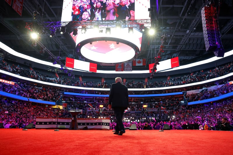 Donald Trump takes the stage at a victory rally in Washington’s Capital One Arena.