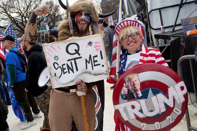 Trump supporter and QAnon follower Jake "The Q Shaman" Angeli attends to the "Stop the Steal" rally on December 12, 2020.