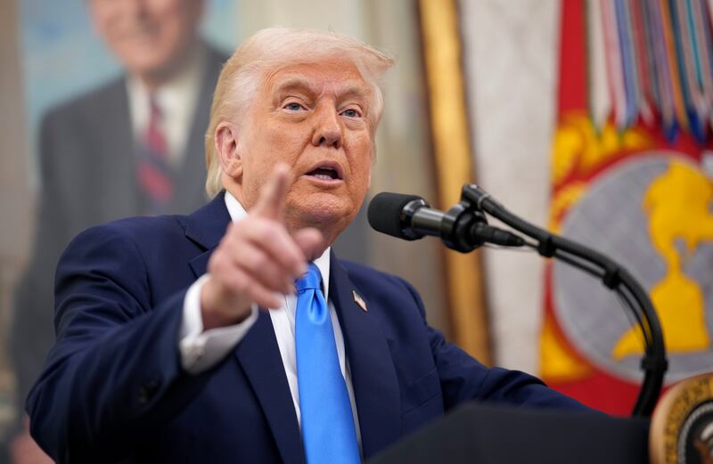 U.S. President Donald Trump announces that his administration has reached a deal with elite law firm Skadden, Arps, Slate, Meagher & Flom during a swearing-in ceremony in the Oval Office at the White House on March 28, 2025 in Washington, DC.