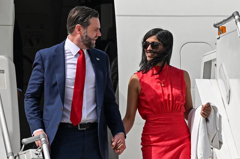 Vice President JD Vance and his wife Usha Vance disembark an aircraft upon their arrival at the airport in New Delhi on April 21, 2025.