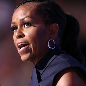 Former US First Lady Michelle Obama speaks on the second day of the Democratic National Convention (DNC) at the United Center in Chicago, Illinois, on August 20, 2024. Vice President Kamala Harris will formally accept the party's nomination for president at the DNC which runs from August 19-22 in Chicago.