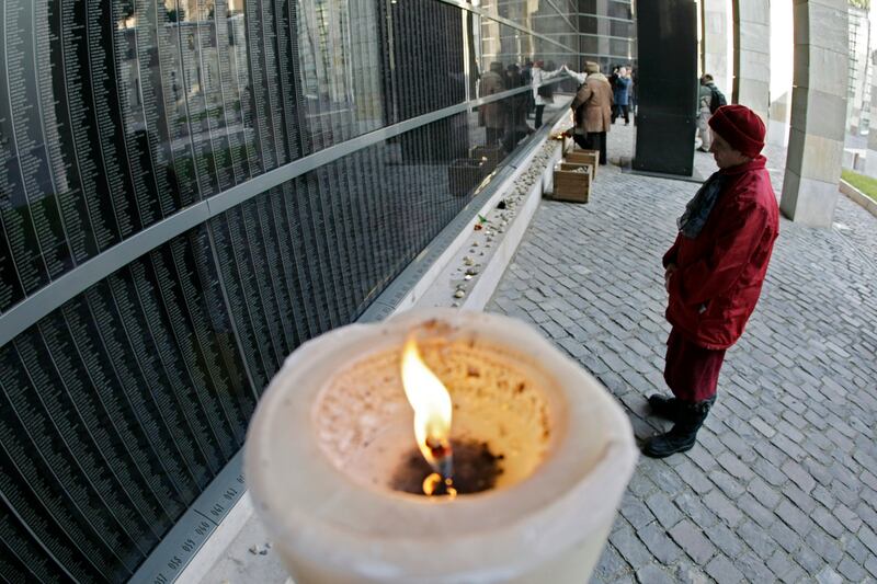 articles/2012/04/17/zionism-denial/holocaust-memorial-candle-openz_lpqklu