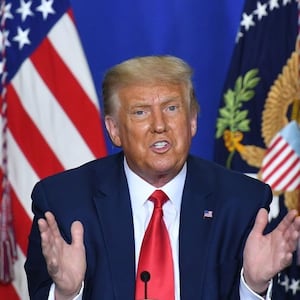 US President Donald Trump speaks to officials during a roundtable discussion on community safety, at Mary D. Bradford High School in in Kenosha, Wisconsin on September 1, 2020. - Trump visited Kenosha, the city at the center of a raging US debate over racism, despite pleas to stay away and claims he is dangerously fanning tensions as a reelection ploy. (Photo by MANDEL NGAN / AFP) (Photo by MANDEL NGAN/AFP via Getty Images)