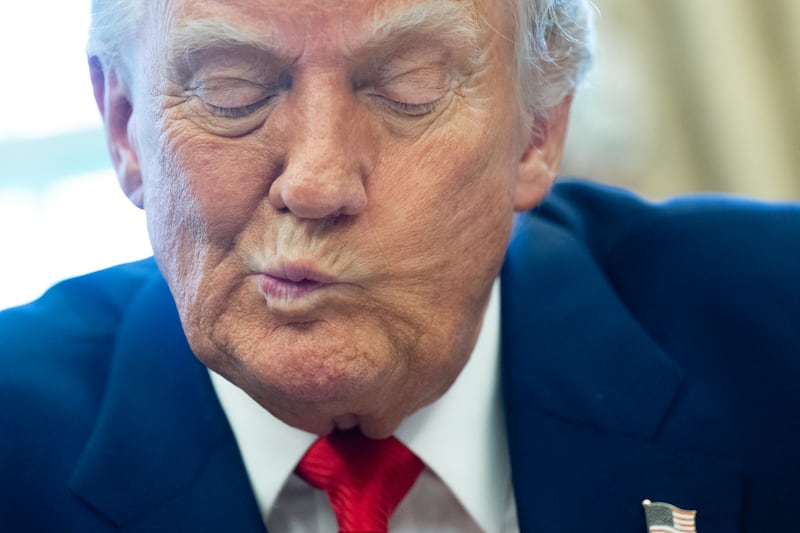 President Donald Trump speaks after signing an executive order in the White House Oval Office on April 9, 2025 in Washington, D.C.