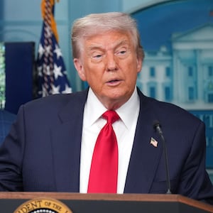President Donald Trump shows crime statistics as he delivers remarks during a press conference in the James S. Brady Press Briefing Room of the White House August 11, 2025 in Washington, DC. Trump announced he will use his authority to place the DC Metropolitan Police Department under federal control