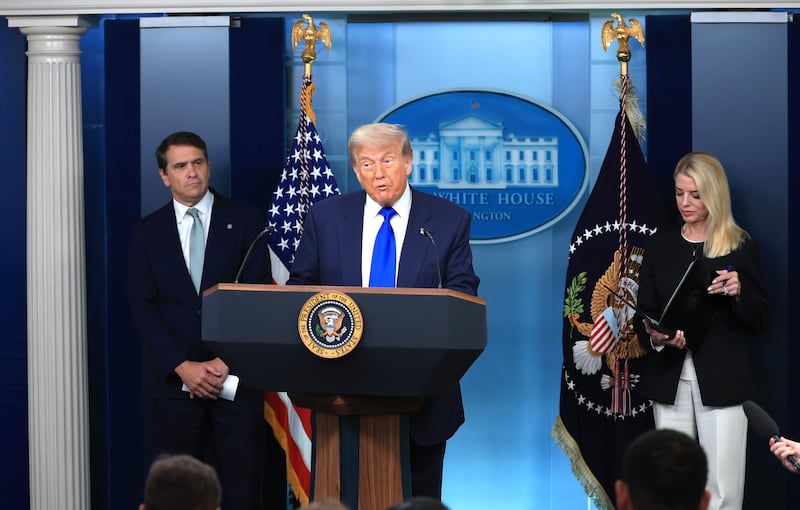 Todd Blanche, Donald Trump, and Pam Bondi.