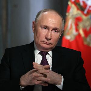 In this pool photograph distributed by Russia's state agency Sputnik, Russian President Vladimir Putin gives an interview to TV host and Director General of Rossiya Segodnya (RIA Novosti) news agency Dmitry Kiselyov (not pictured) at the Kremlin in Moscow on March 12, 2024.