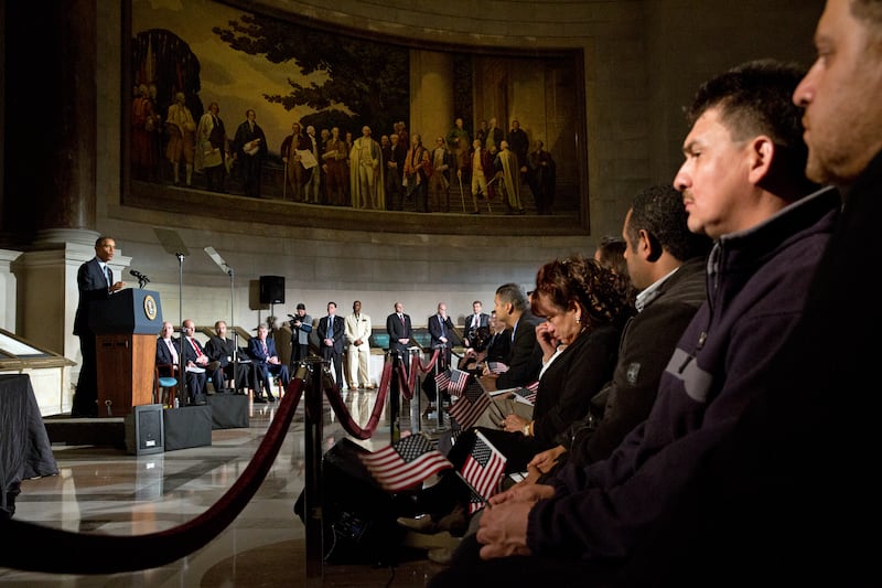 U.S. President Barack Obama speaks during a naturalization ceremony for new citizens at the National Archive Building  in Washington, D.C. on December 15, 2015.