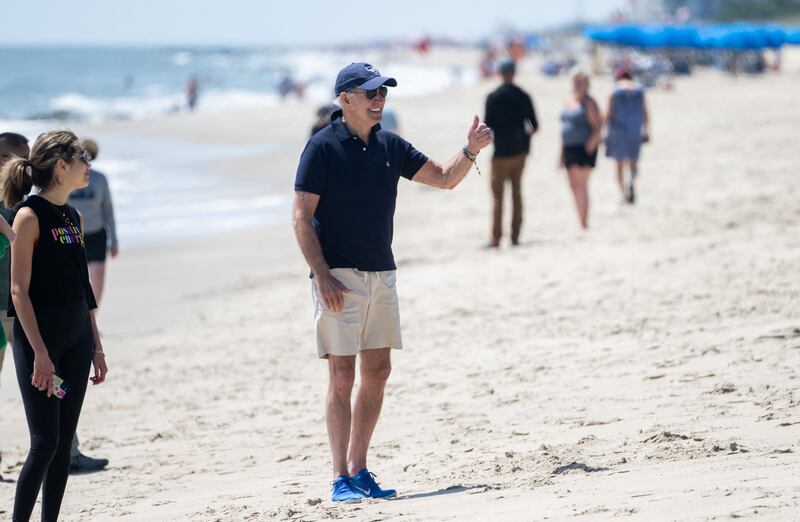 Then-President Joe Biden walks on the beach in Rehoboth Beach, Delaware in 2022.