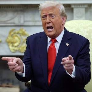 WASHINGTON, DC - APRIL 14: U.S. President Donald Trump gestures as he meets with President Nayib Bukele of El Salvador in the Oval Office of the White House April 14, 2025 in Washington, DC. Trump and Bukele were expected to discuss a range of bilateral issues including the detention of Kilmar Armando Abrego Garcia, who has been held in a prison in El Salvador since March 15.  (Photo by Win McNamee/Getty Images)