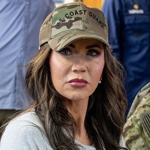 Department of Homeland Security Secretary Kristi Noem speaks with U.S. Coast Guard Rear Admiral Joseph Buzzella in San Diego, Calif., March 16, 2025.