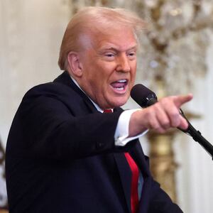U.S. President Donald Trump gestures while speaking during a Women's History Month event in the East Room of the White House on March 26, 2025 in Washington, DC.