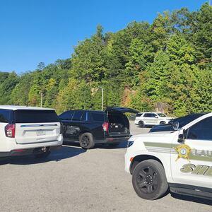 An image of Laurel County Sheriff's Office vehicles following a highway shooting in Kentucky.