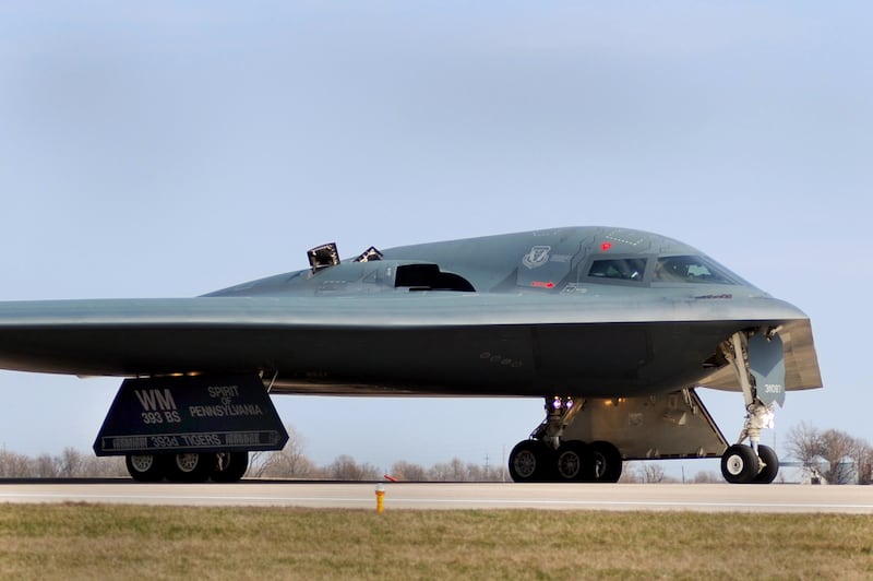 One of three Air Force Global Strike Command B-2 Spirit bombers returns to home base at Whiteman Air Force Base in Missouri, March 20, 2011 after striking targets in support of the international response which is enforcing a no-fly zone over Libya. The B-2s landed at Whiteman Air Force Base, Missouri after a more than 25-hour mission in support of Operation Odyssey Dawn. The bombers employed 45 guided Joint Direct Attack Munitions, each weighing 2,000 pounds, against hardened aircraft shelters in Libya.