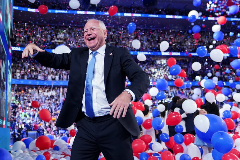 Democratic vice presidential nominee Tim Walz reacts as balloons fall at the Democratic National Convention in Chicago, Illinois on August 22, 2024.