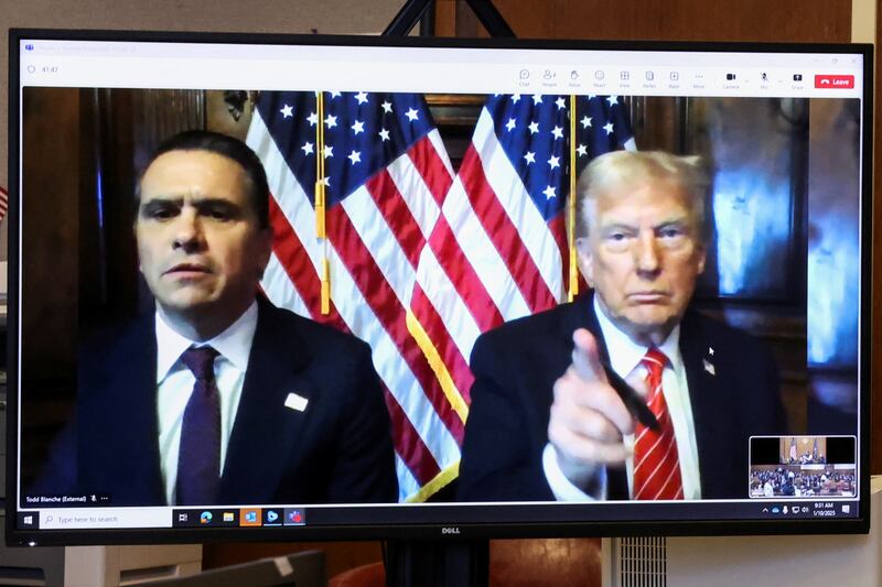 Donald Trump appears remotely for a sentencing hearing Friday alongside his attorney, Todd Blanche.