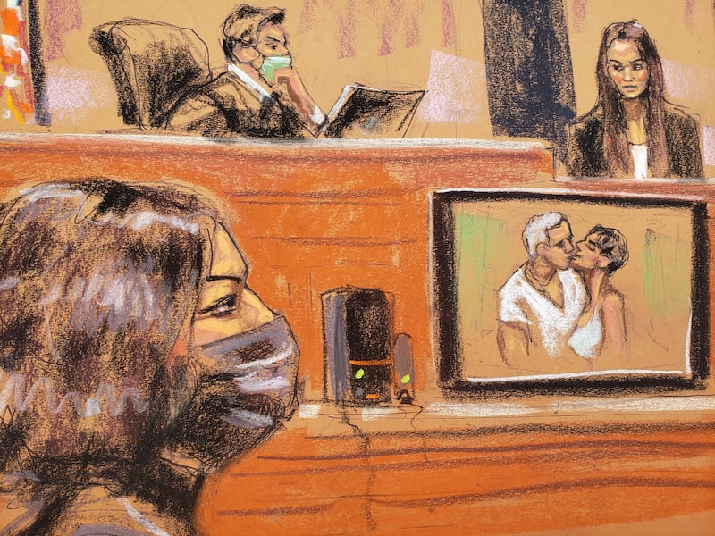 A photo of Ghislaine Maxwell and Jeffrey Epstein is shown as FBI analyst Kimberly Meder testifies during the trial of Maxwell, the Jeffrey Epstein associate accused of sex trafficking, in a courtroom sketch in New York City on December 7, 2021.