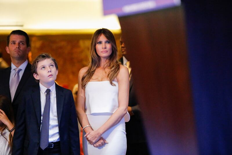 Melania and Barron Trump and family listen as Donald Trump makes an official announcement that he will enter the 2016 presidential campaign at Trump Tower in New York City on June 16, 2015.