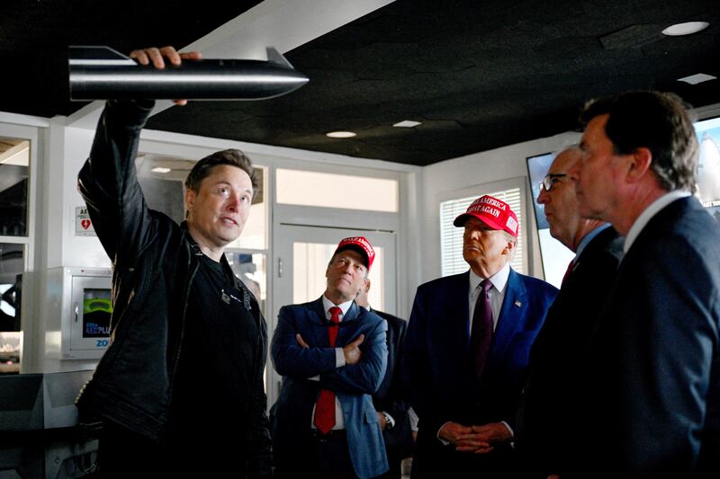 Elon Musk gives a tour to President-elect Donald Trump before the launch of a SpaceX Starship rocket test flight in Brownsville, Texas on November 19, 2024.