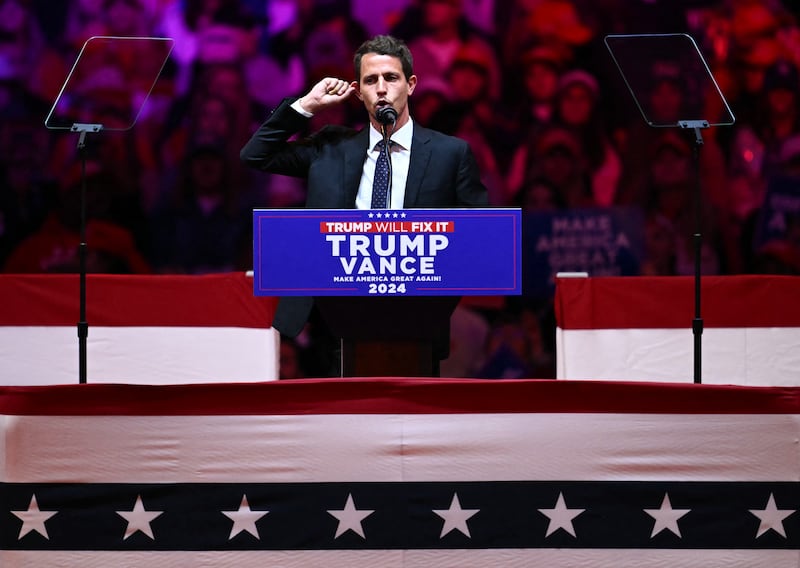 Tony Hinchcliffe speaks during a campaign rally