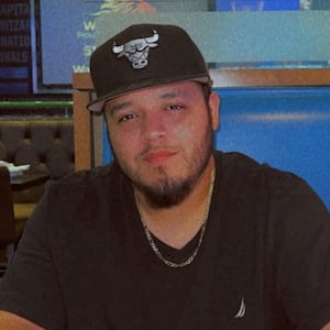Kilmar Abrego Garcia, a Salvadoran migrant who lived in the U.S. legally with a work permit and was erroneously deported to El Salvador, is seen wearing a Chicago Bulls hat.