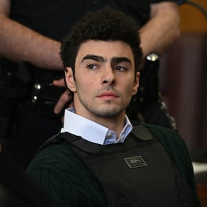 NEW YORK, NEW YORK - FEBRUARY 21:  Luigi Mangione appears at a hearing for the murder of UHC CEO Brian Thompson at Manhattan Criminal Court on February 21, 2025 in New York City.  Mangione is accused of slaying of UnitedHealthcare CEO Brian Thompson late last year and is making his first appearance on state charges of murder as an act of terrorism. He is facing 11 counts for the Dec. 4 shooting of Thompson outside a midtown Manhattan hotel which set off a massive manhunt. He is also facing federal charges of murder and other charges in Pennsylvania, where he was arrested. (Photo by Curtis Means - Pool/Getty Images)
