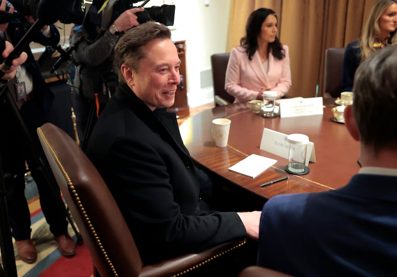 Elon Musk wrote 'Top Secret' on his notepad.