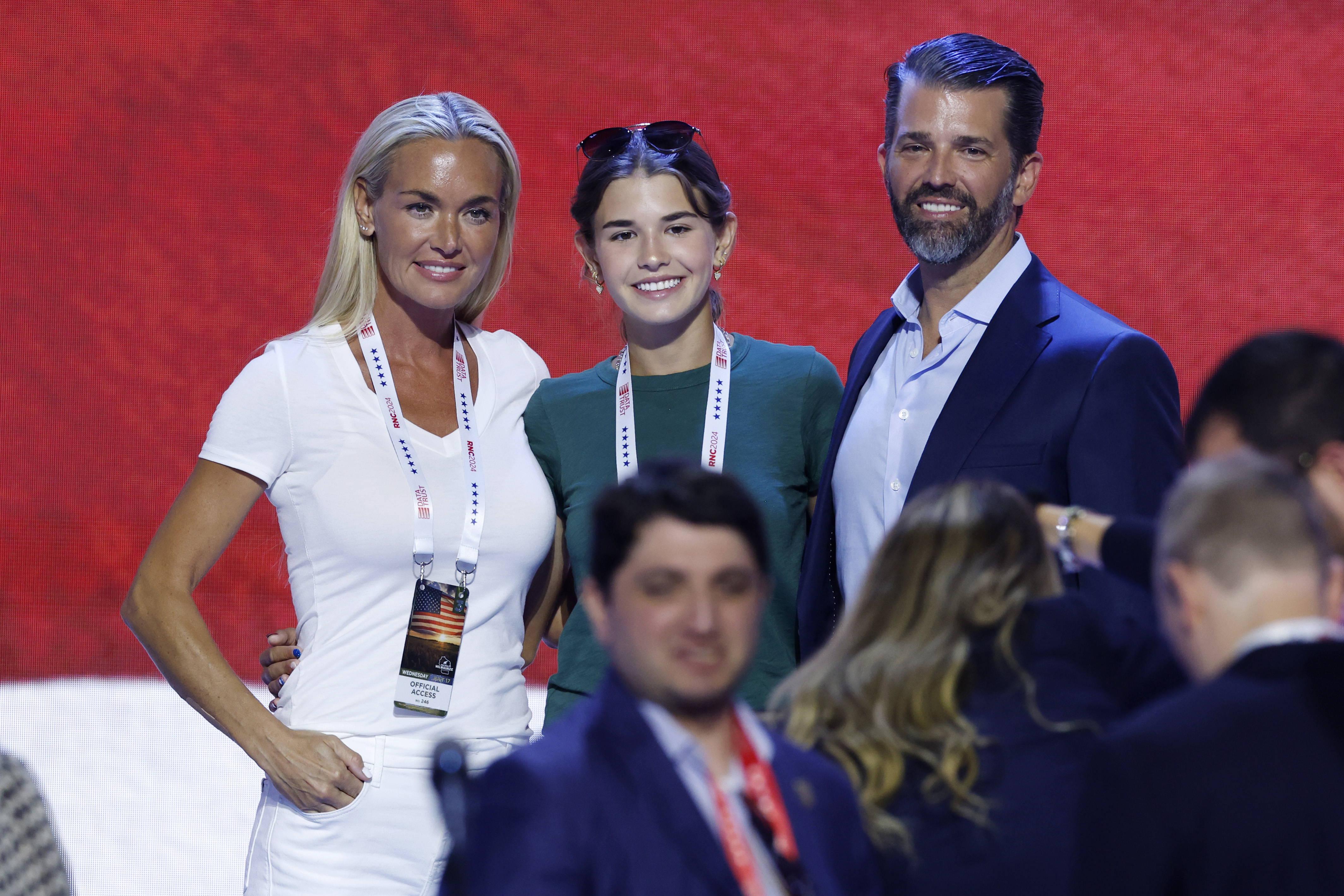 (L-R) Vanessa Trump, Kai Trump and Donald Trump Jr., stand on stage before the start of the third day of the Republican National Convention at the Fiserv Forum on July 17, 2024 in Milwaukee, Wisconsin.