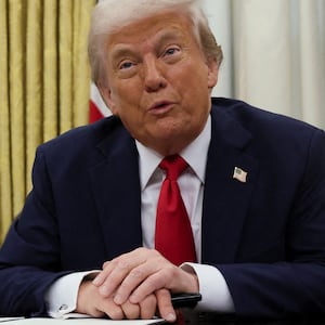 President Donald Trump speaks next to Kid Rock during a press conference and executive order signing in the White House Oval Office in Washington, D.C., on March 31, 2025.