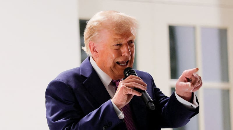 Donald Trump speaks at a dinner for lawmakers on the newly renovated Rose Garden patio.