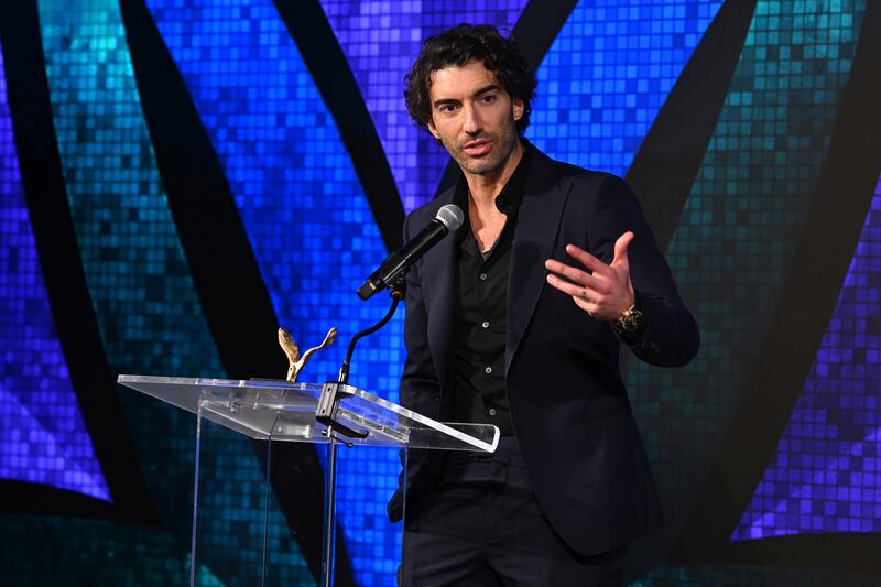 NEW YORK, NEW YORK - DECEMBER 09: Actor/filmmaker and VOS Honoree, Justin Baldoni speaks onstage at the Vital Voices 12th Annual Voices of Solidarity Awards at IAC Building on December 09, 2024 in New York City. (Photo by Bryan Bedder/Getty Images for  Vital Voices Global Partnership)