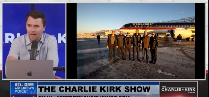 Charlie Kirk shares a photos himself and Donald Trump Jr. standing in front of Trump Force One in Greenland.