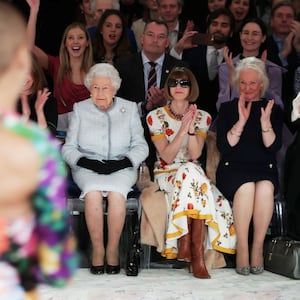 Queen Elizabeth with Vogue editor Anna Wintour and dresser Angela Kelly.