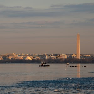 Coast Guard investigators searching the Potomac River on Thursday