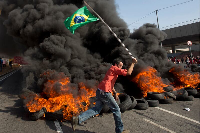 articles/2014/05/30/brazil-s-world-cup-is-an-expensive-exploitative-nightmare/140529-verikaitis-world-cup-protest-tease_lip4a2