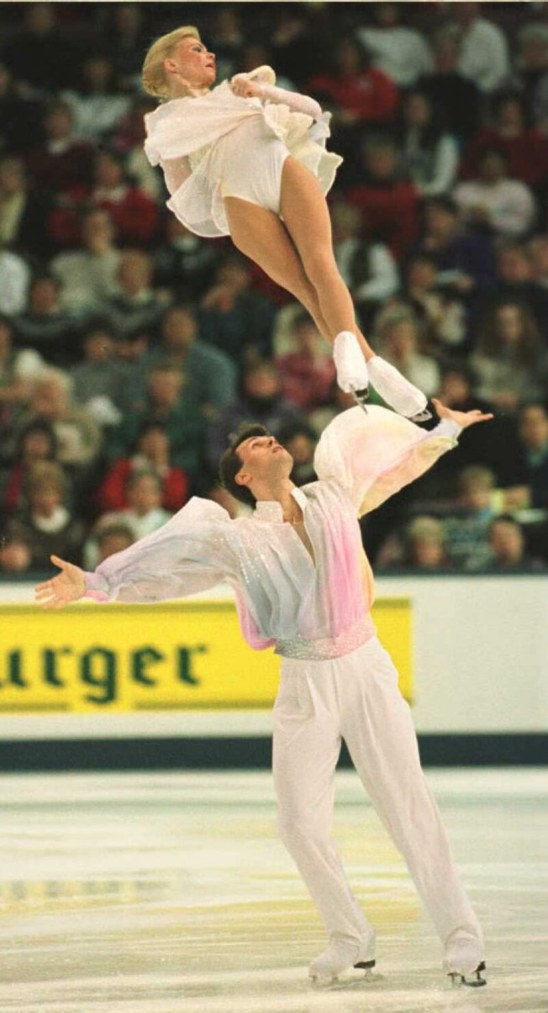 Vadim Naumov and Evgenia Shishkova compete at the World Figure Skating Championships in Edmonton, Canada, in 1996.