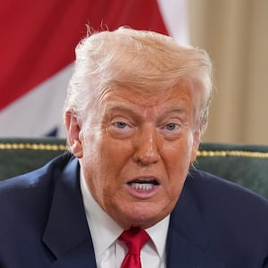 Donald Trump gestures as he meets British Prime Minister Keir Starmer for bilateral talks at Trump Turnberry golf club on July 28, 2025 in Turnberry, Scotland.