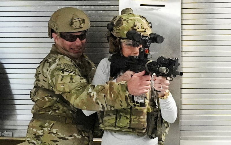 Kristi Noem participates in a ship assault demonstration