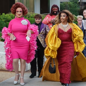 WASHINGTON, DC - JUNE 11: Guests, including several drag queens walk to the Kennedy Center to attend the opening performance of Les Misérables on June 11, 2025 in Washington, DC. U.S. President Donald Trump and First Lady Melania Trump attended the musical. (Photo by Kevin Carter/Getty Images)